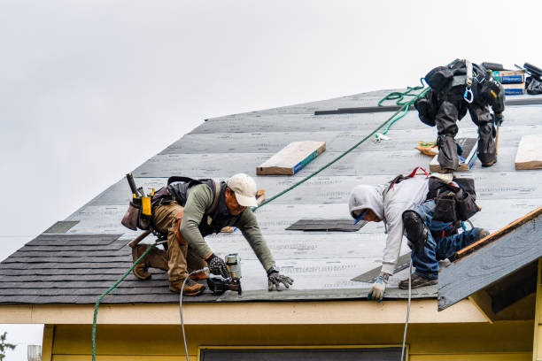 Professional Gutter Installation technician working in Easton, KS